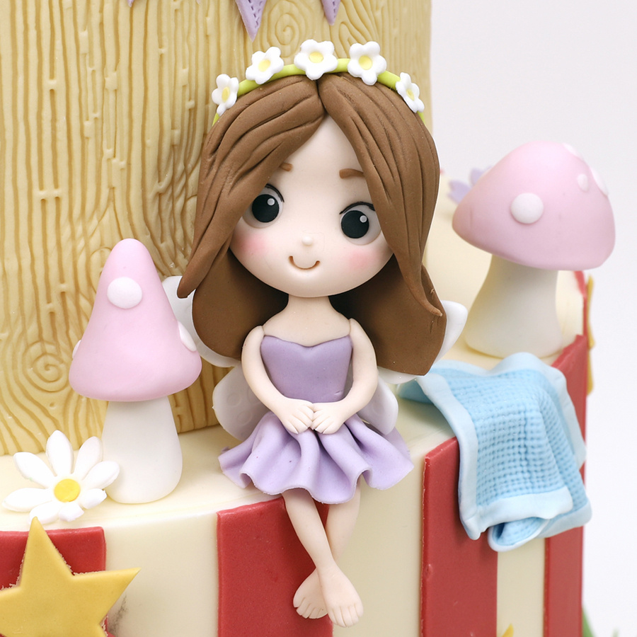 Circus and fairy themed cake