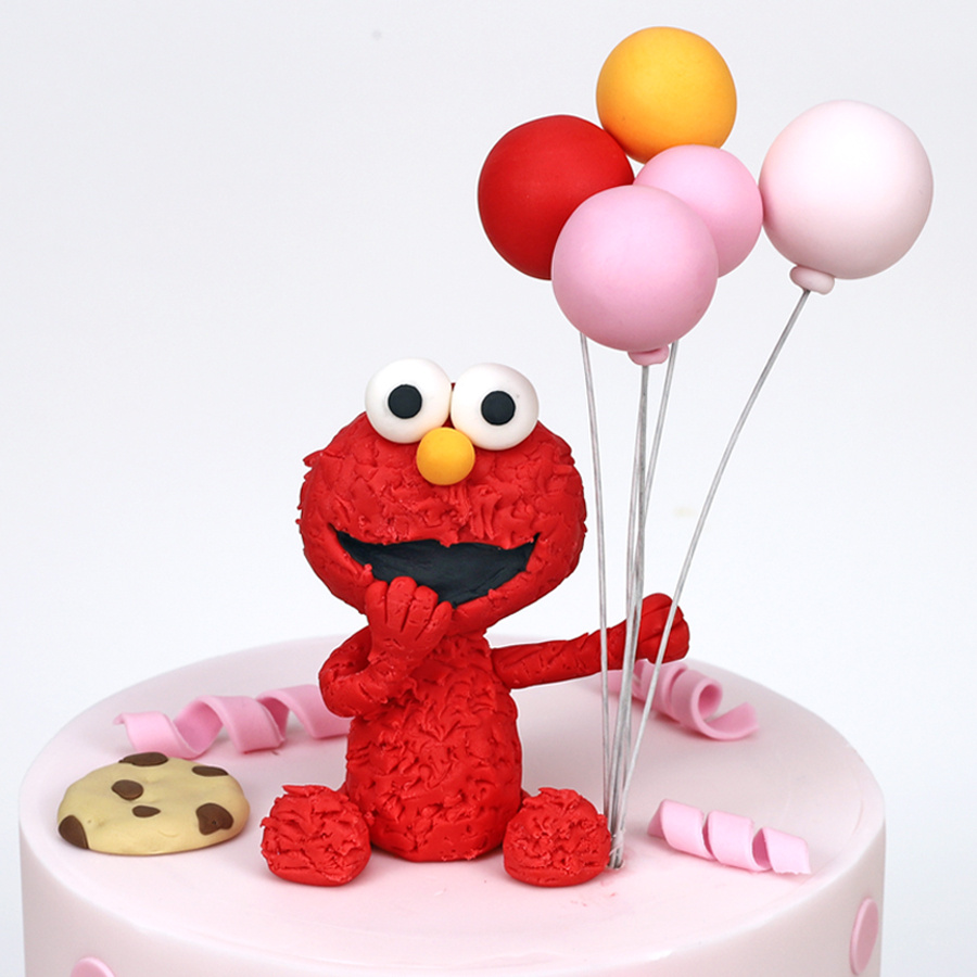 Elmo and Cookie Monster cake