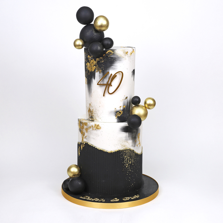 Modern black and gold cake